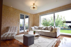 Spacieux appartement avec jardin